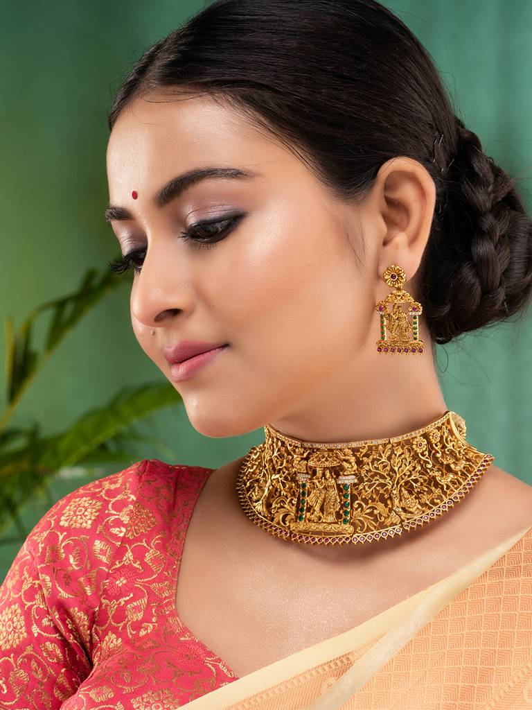 Gold Plated Green Stone Studded Radha Krishna Temple Jewellery Set : SJNK1860