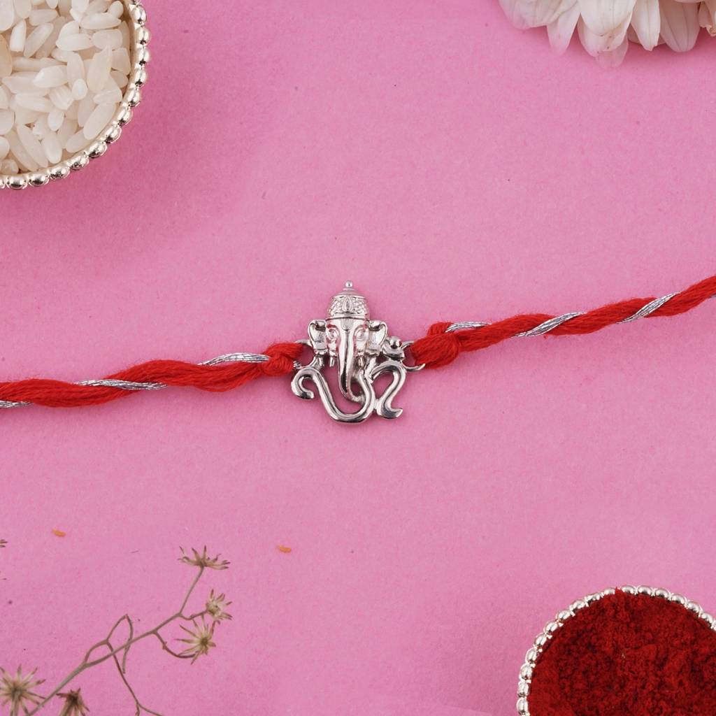 Silver Om Ganesh Face Rakhi : ZLRH-1017