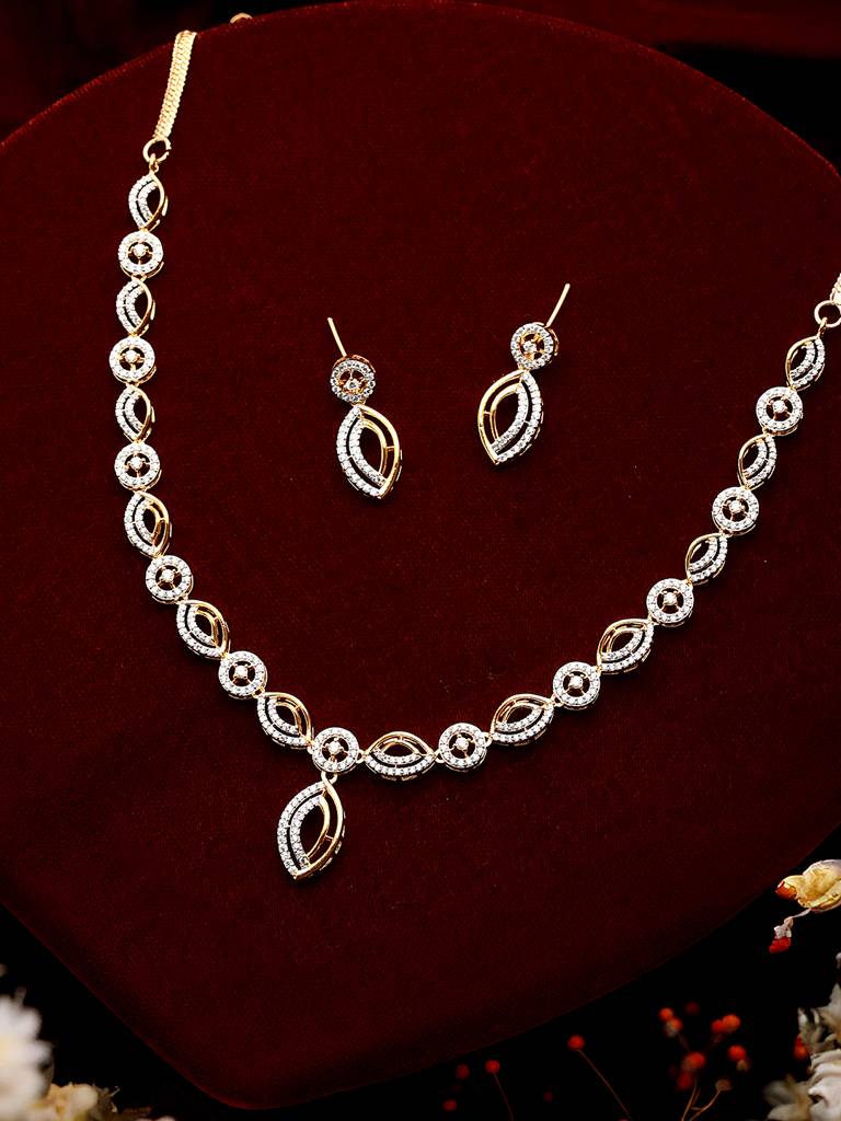 Gold Toned Ad Studded Minimal Leaf Design Pendant Jewellery Set : SJNK2572