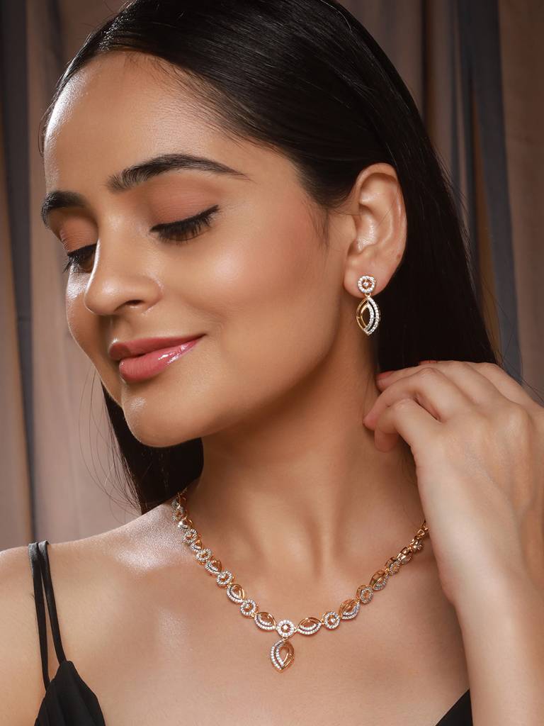 Gold Toned Ad Studded Minimal Leaf Design Pendant Jewellery Set : SJNK2572