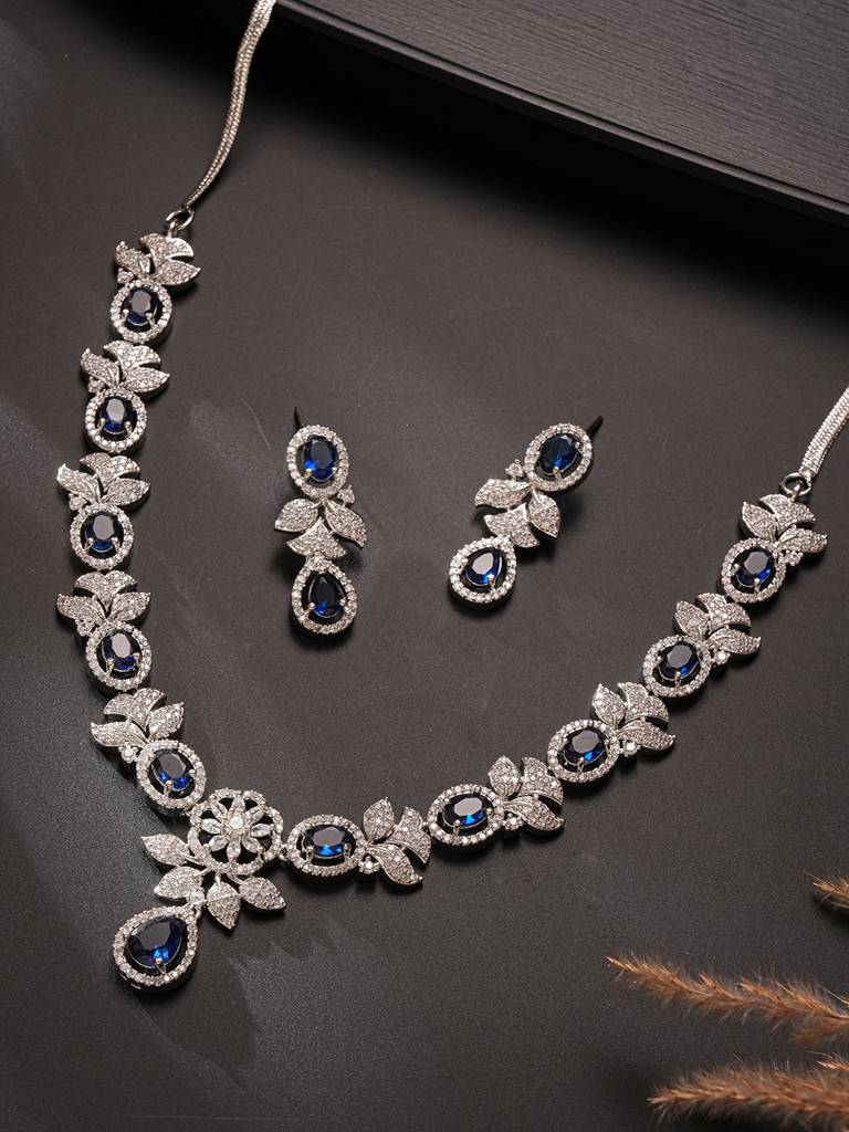 Silver Toned Sapphire Blue Ad Studded Floral Delicate Statement Jewellery Set : SJNK2829