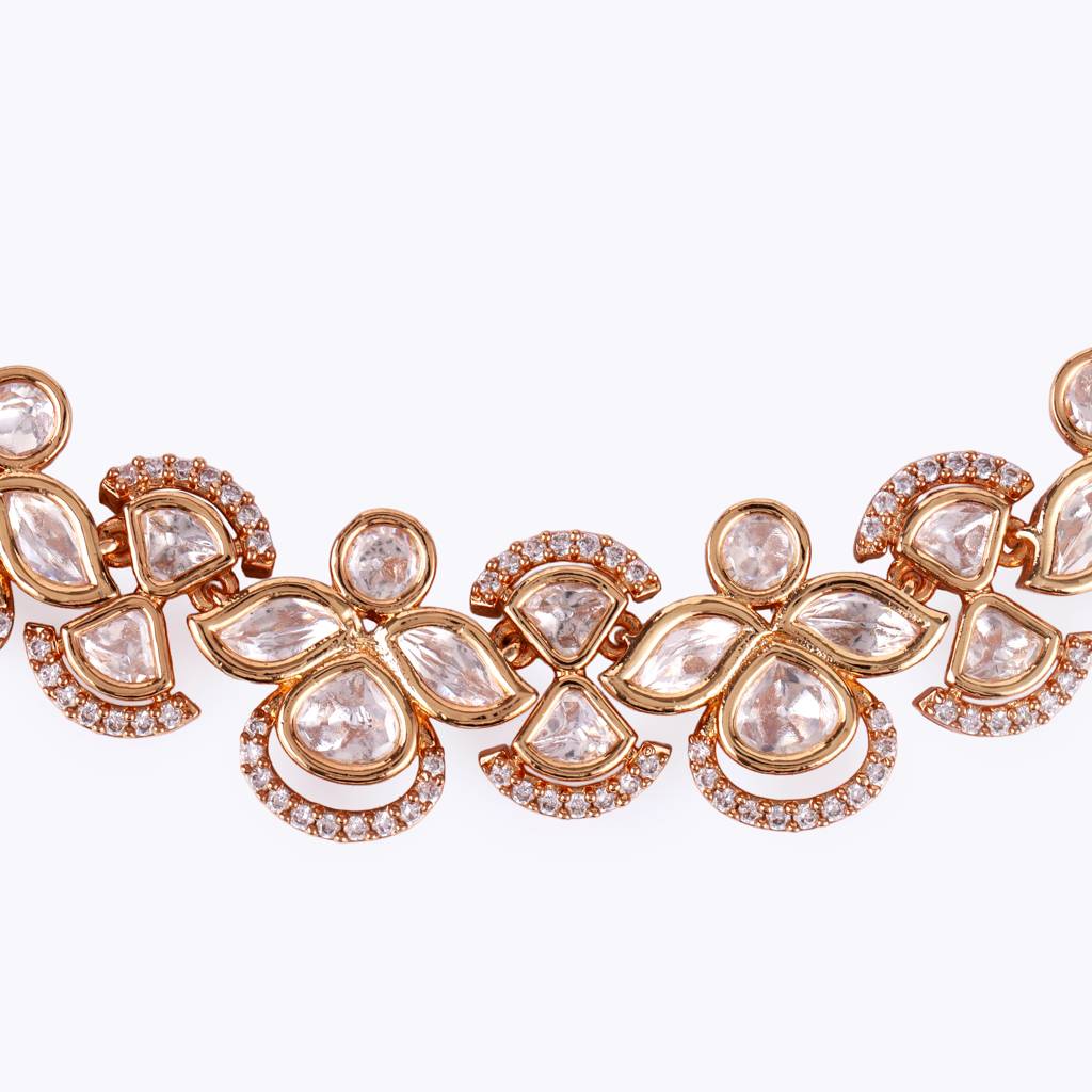 Elegant Leaf Design Uncut Kundan Stone 18 Kt Gold Plated Brass Choker Necklace Set With Maang Tikka For Women And Gi : 30NS695