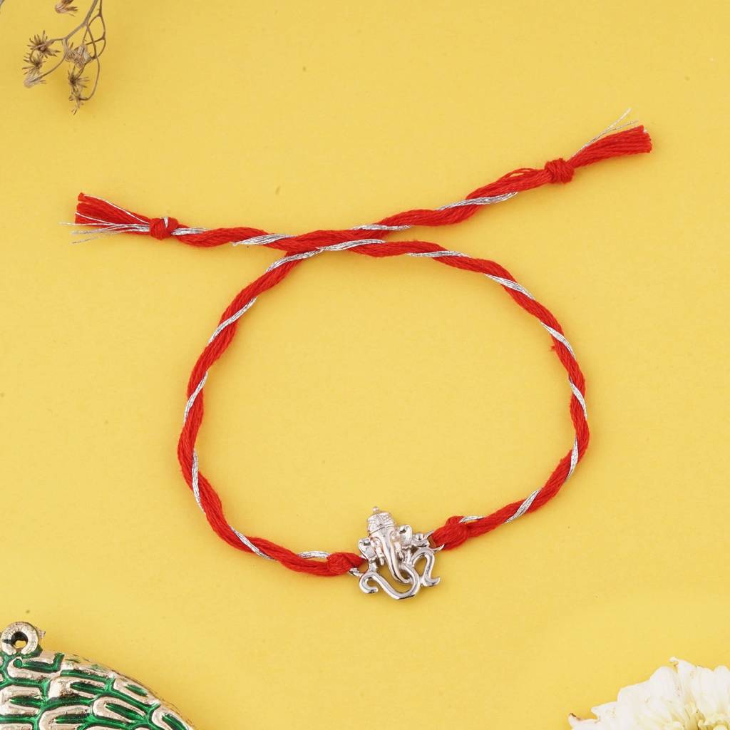 Silver Om Ganesh Face Rakhi : ZLRH-1017