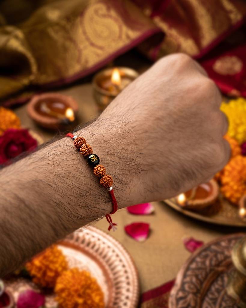 925 Silver Rakhi With Rudraksha And Aum Mani : IS-RK-ST-1013