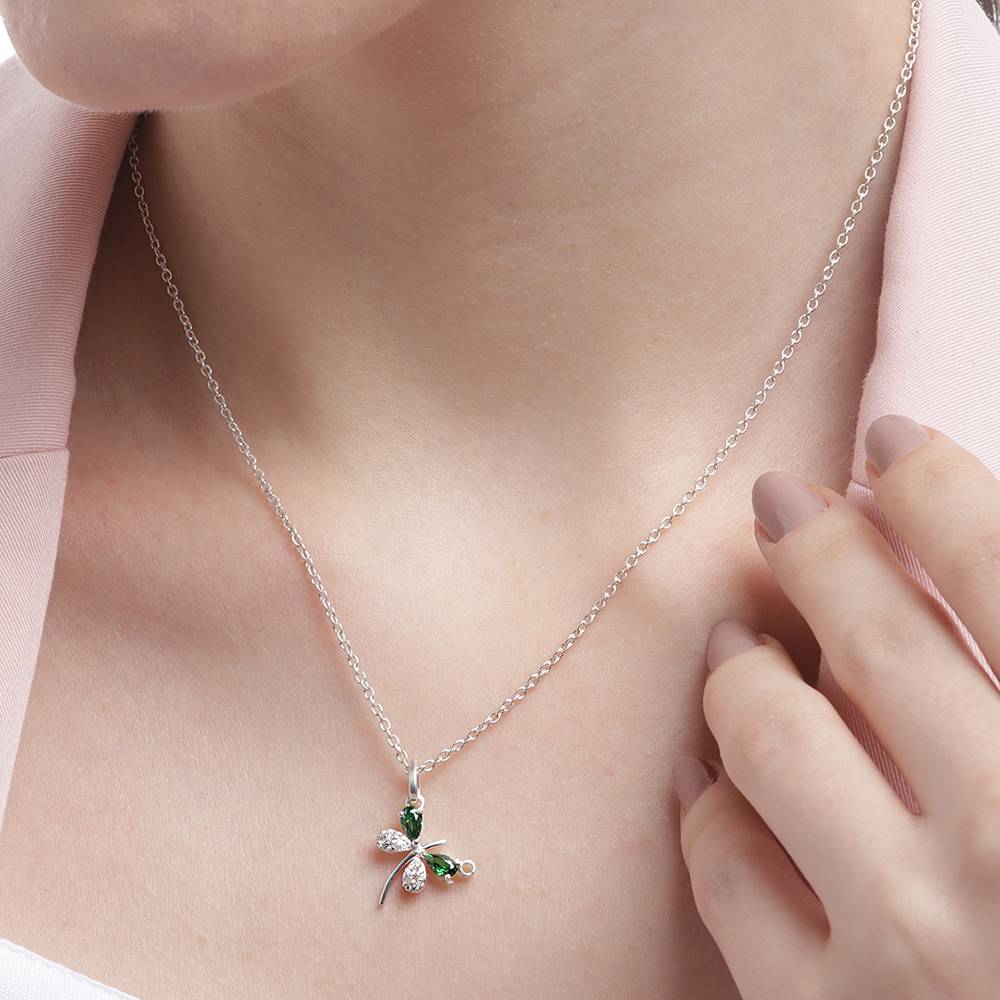 Dazzle In Simplicity With Our Minimal Silver Butterfly Necklace, Accentuated By A Captivating Aaa Grade Green And White 