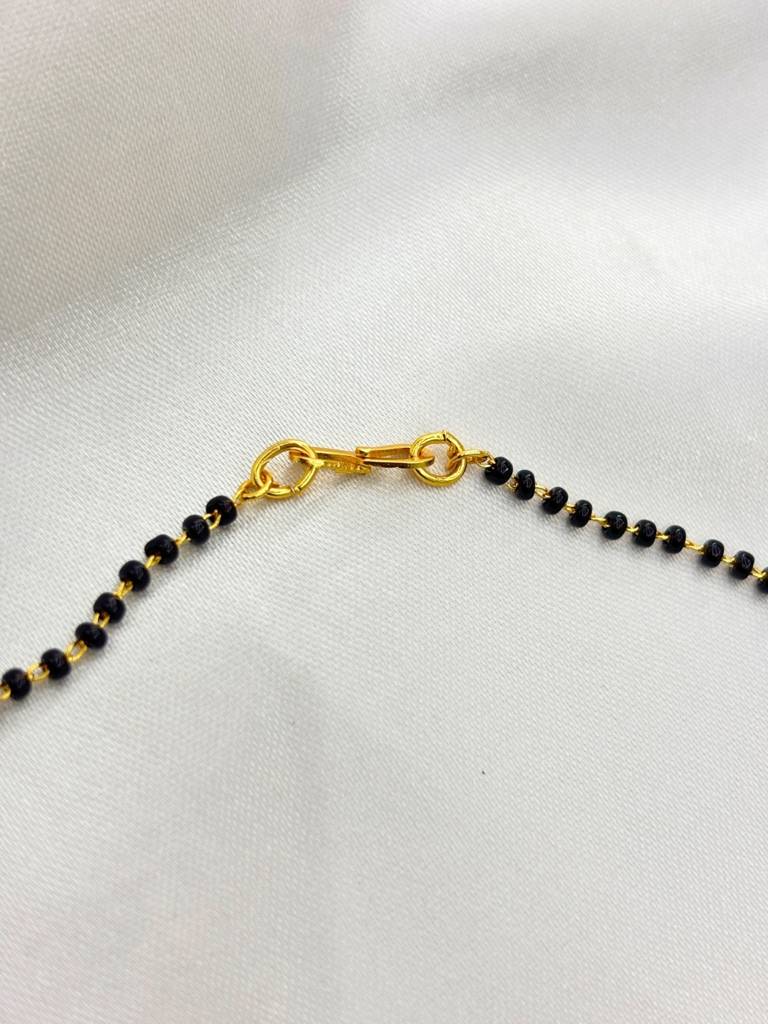 Gold Plated Ad & Cz Studded With Gold & Black Beads Mangalsutra Necklace : VI26MSAD100008