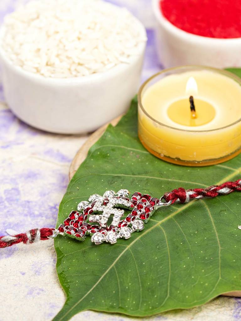 Exclusive American Diamond Maroon Swastik Rakhi Bracelet With Grey Maroon Dori Roli Chawal For Boys & Men : LAARKAD05