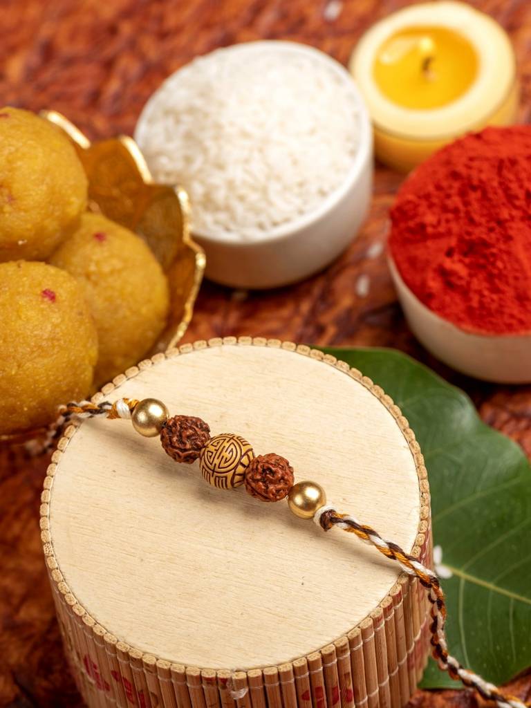 Eternz Certified Jewellery - Look and Adorn Handmade Acrylic Carved Bead Rudraksh Golden Rakhi For Men And Boys