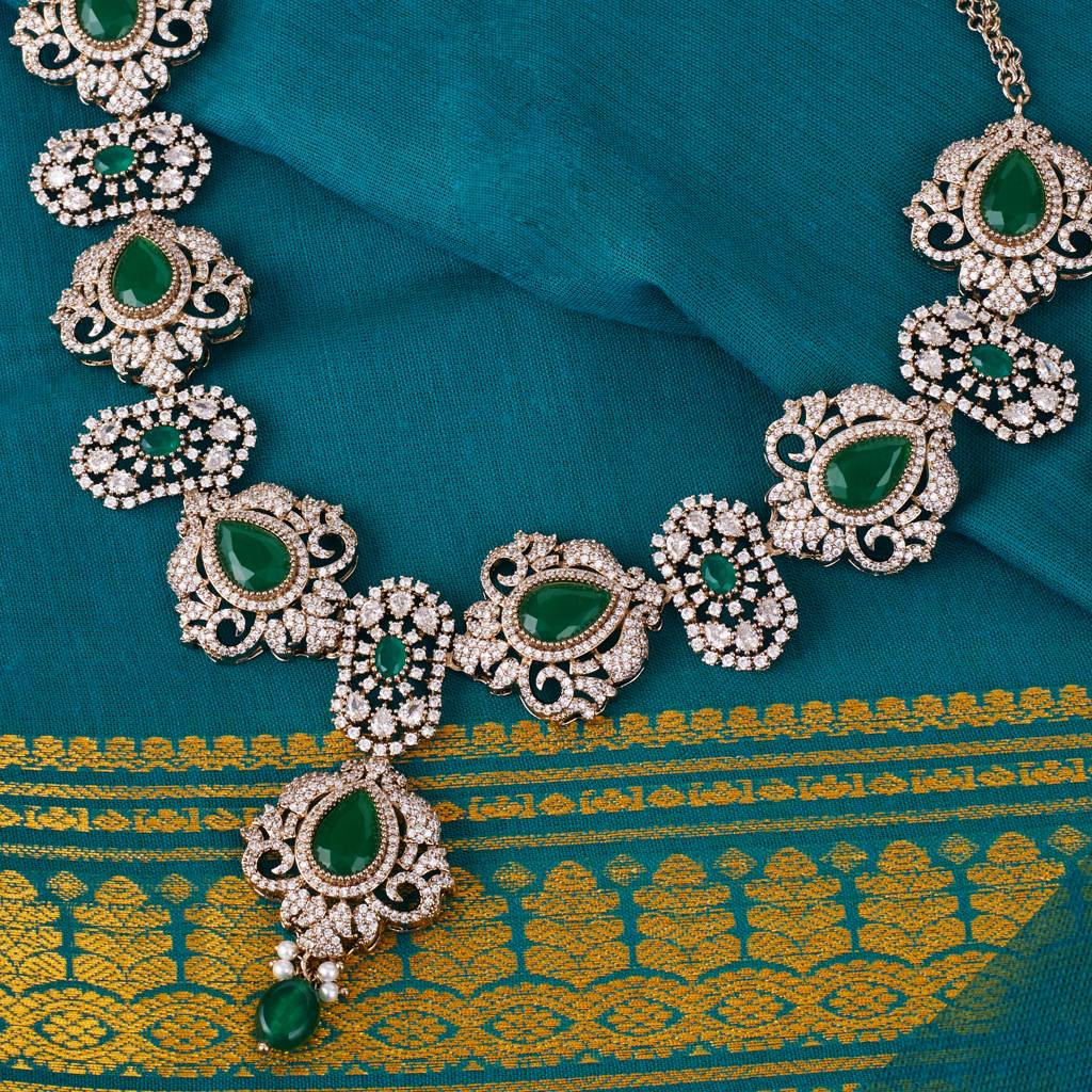 Lavish Oval And Flower Design Uncut Kundan Stone Gold Plated Brass Choker Necklace Set For Women And Girls : 64NS110