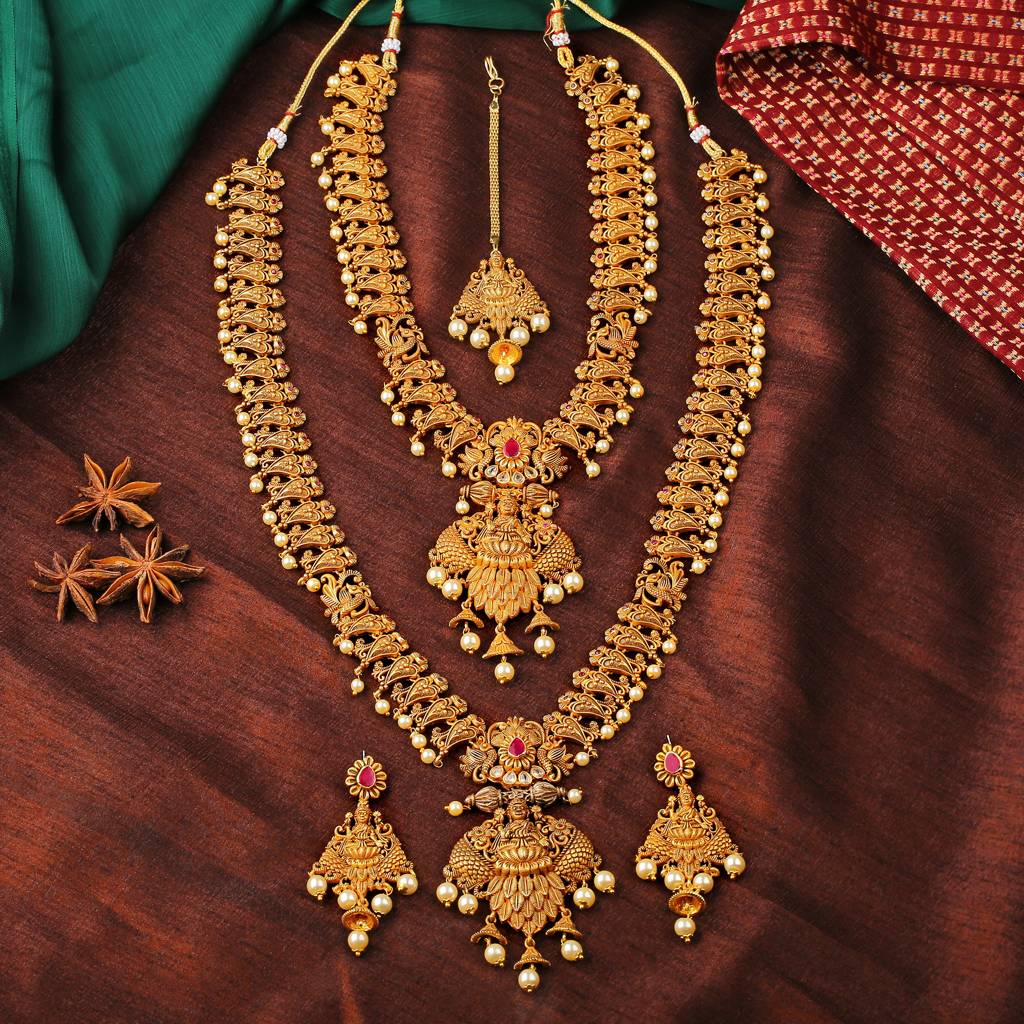 Estele Gold Plated Sacred Laxmi Ji Bridal Necklace Set Combo With Pearls For Women : AD-611-IGNKER