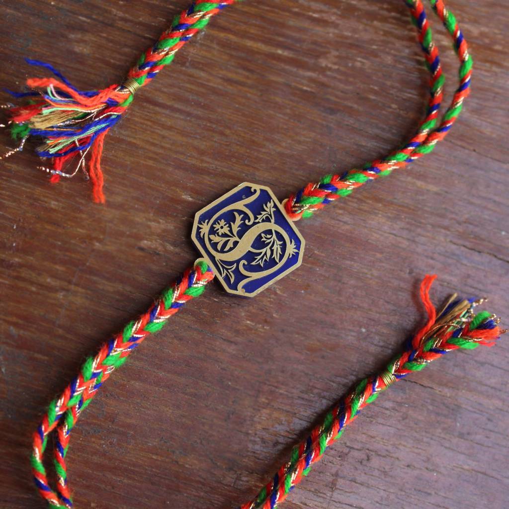 Eternz Certified Jewellery - Be Abhika Royal Blue Floral Initial Personalised Rakhi With Roli Chawal