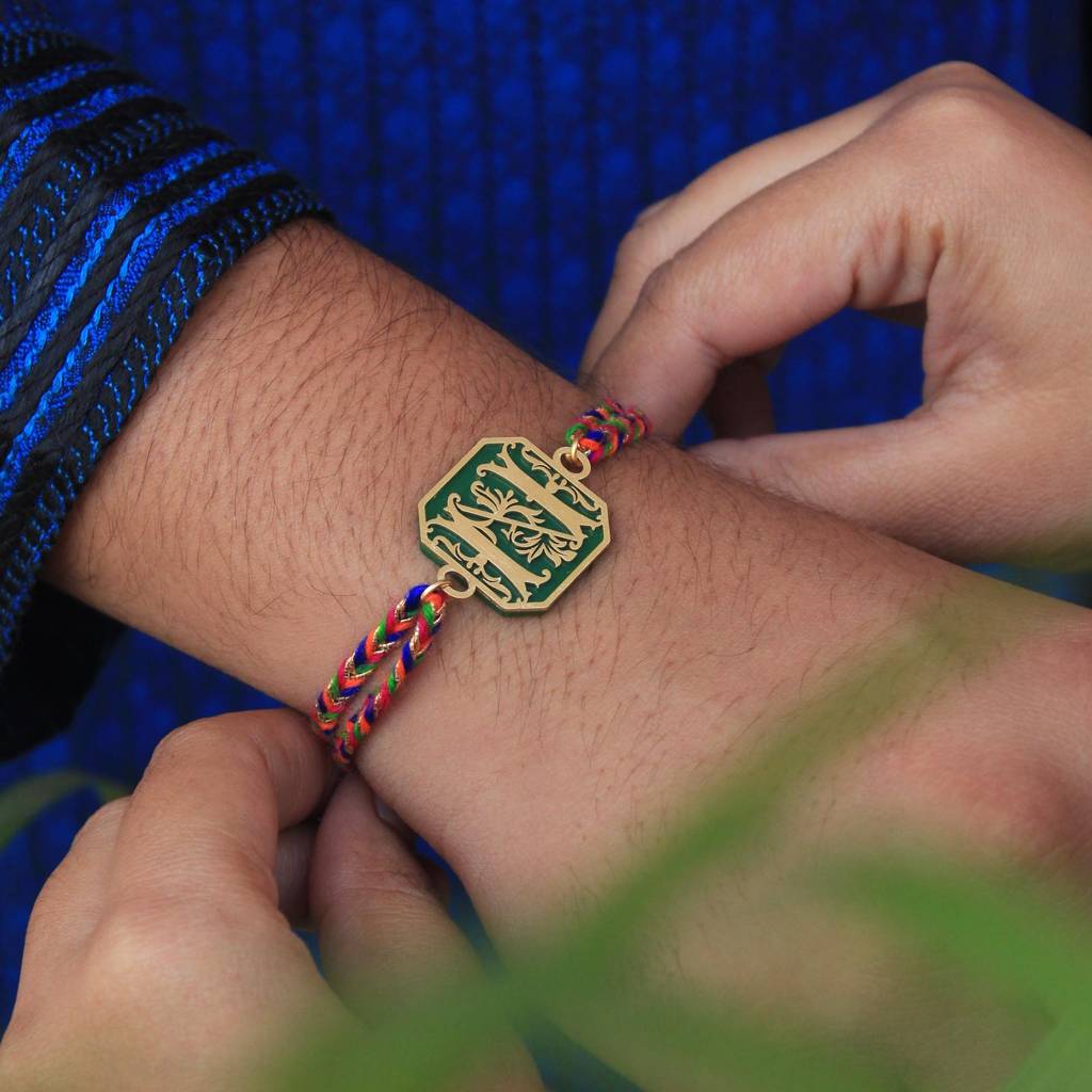Green Floral Initial Acrylic Rakhi With Roli Chawal : ACJR061