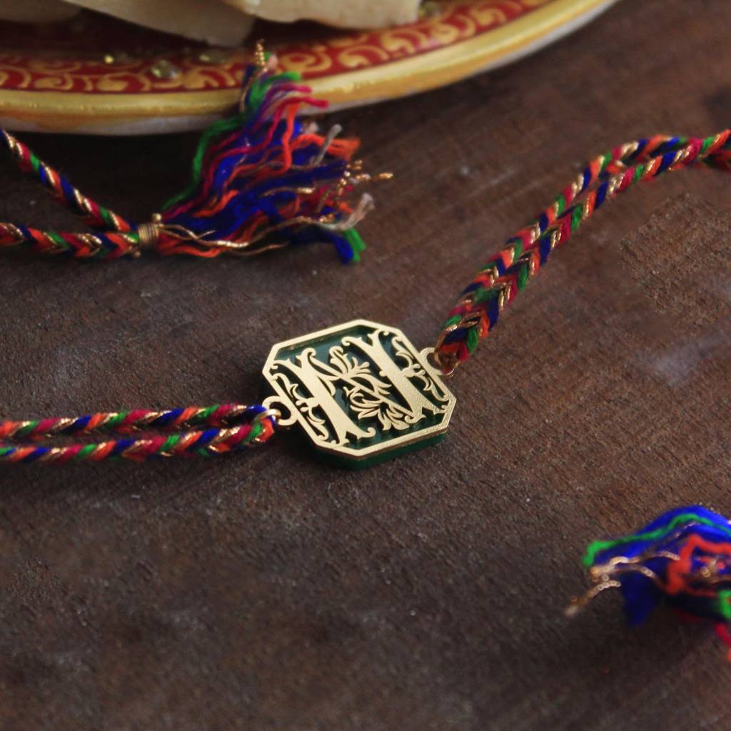 Green Floral Initial Acrylic Rakhi With Roli Chawal : ACJR061