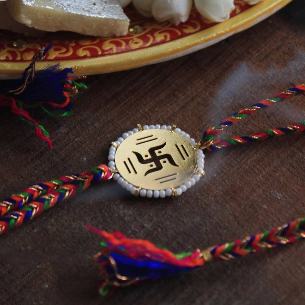 Golden Beaded Swastik Rakhi With Roli Chawal : ACJR063