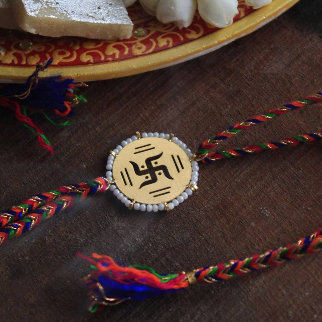 Golden Beaded Swastik Rakhi With Roli Chawal : ACJR063