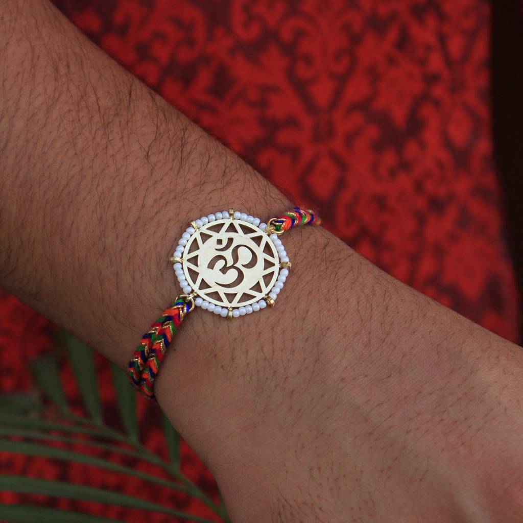 Golden Beaded Om Rakhi With Roli Chawal : ACJR064