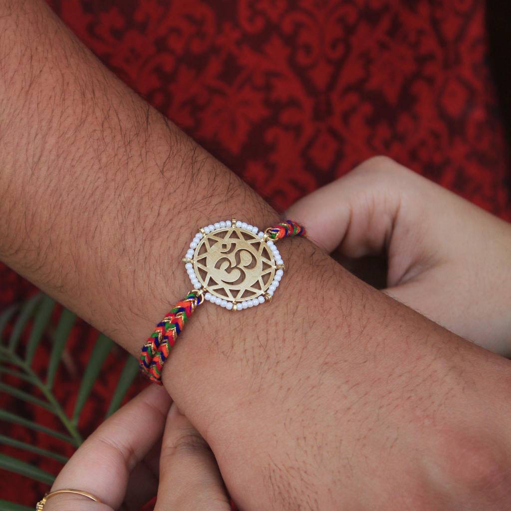 Golden Beaded Om Rakhi With Roli Chawal : ACJR064