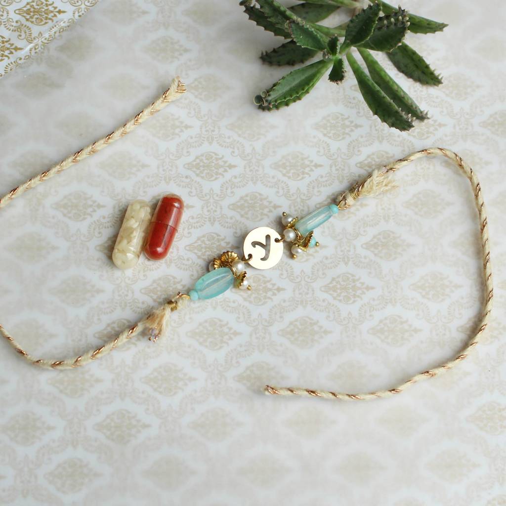 Eternz Certified Jewellery - Be Abhika Shades Of Sea Green Stones Personalised Rakhi With Roli Chawal