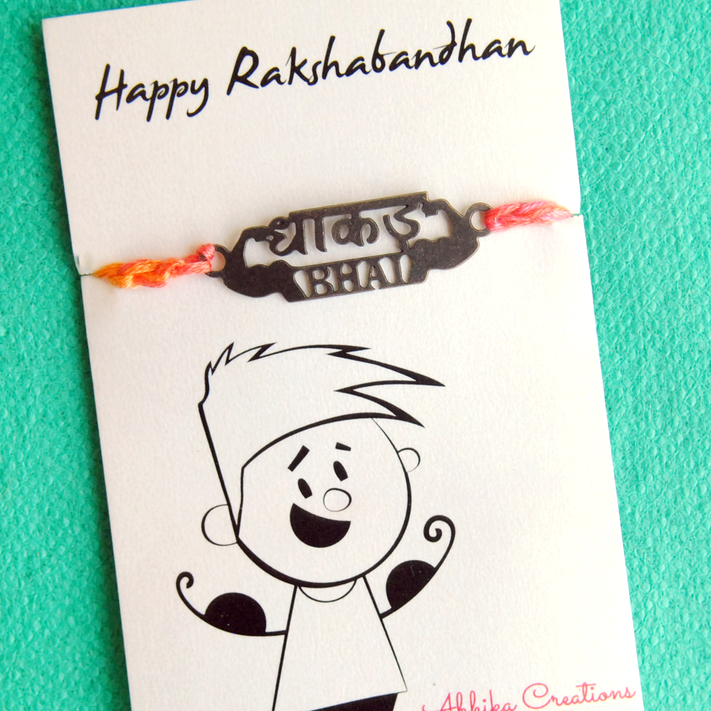 Dhakad Bhai Rakhi With Roli Chawal Capsules : ACQR020-B