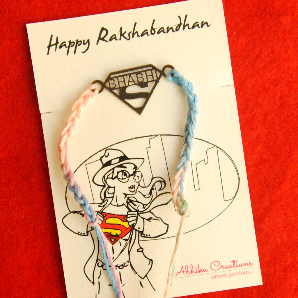 Super Bhabhi Quirky Rakhi With Roli Chawal Capsules : ACQR023-B