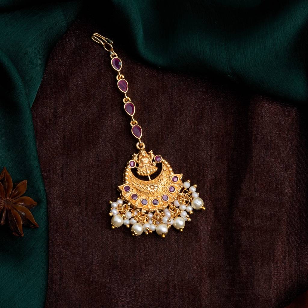 Estele Gold Plated Divine Laxmi Ji Designer Maang Tikka With Pearl For Women : AD-MT-001-IGTIKAA