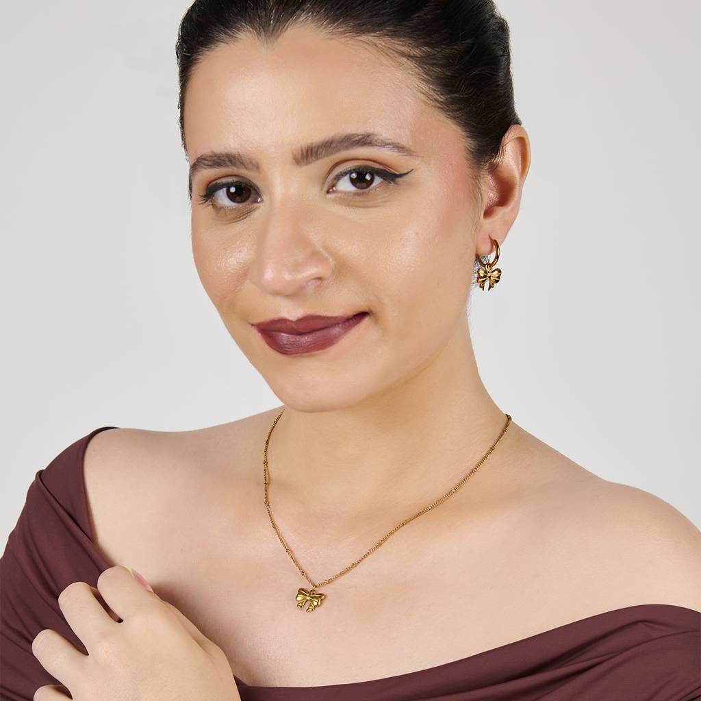 18K Gold Plated Waterproof Anti-Tarnish Ribbon Bow Pendant And Studs Set : ANX0125PS215C