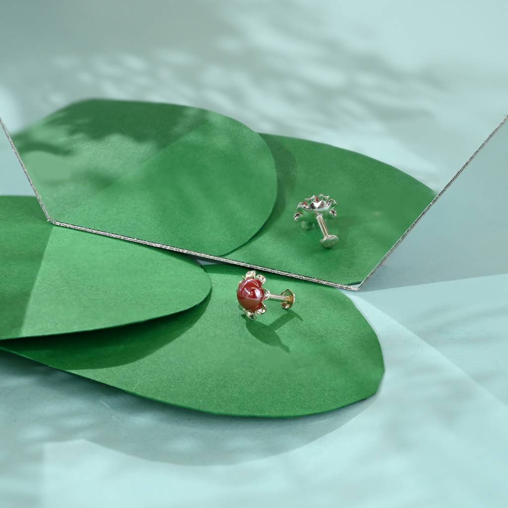 Silver Flowy Circular Red Nose Pin : KNP175
