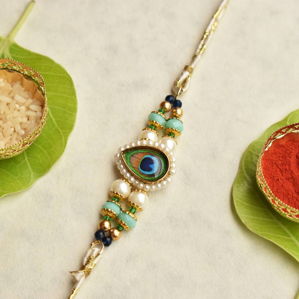 Eternz Certified Jewellery - Be Abhika Mor Pankh Beaded Rakhi With Roli Chawal Capsules