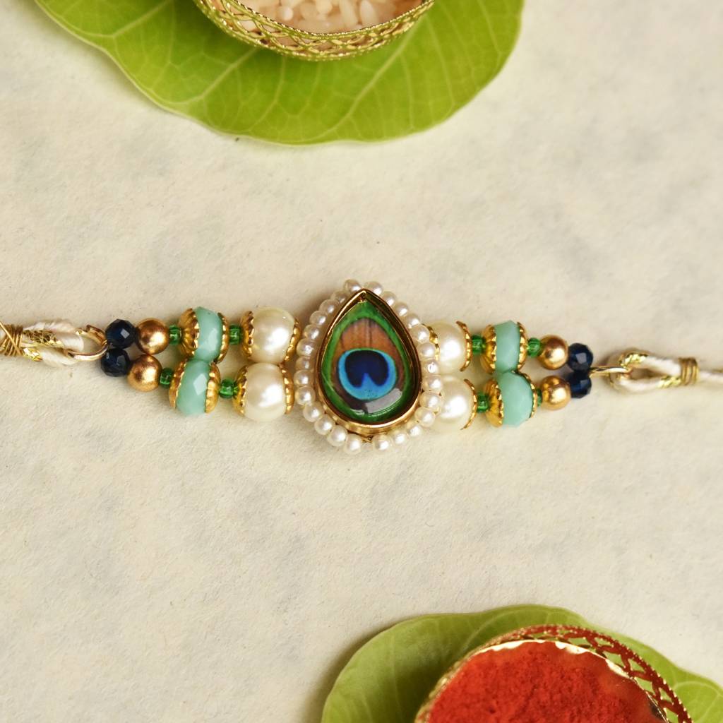 Mor Pankh Beaded Rakhi With Roli Chawal Capsules : ACJR091
