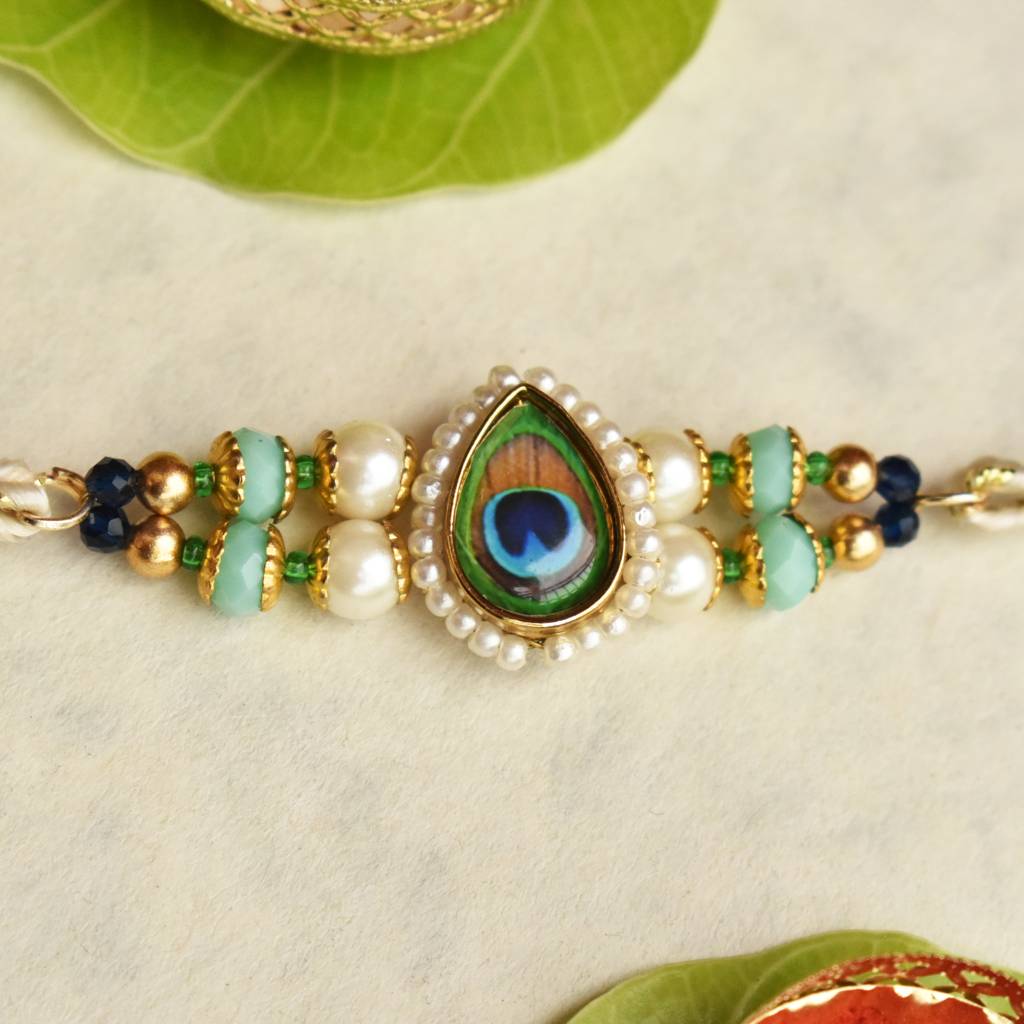 Mor Pankh Beaded Rakhi With Roli Chawal Capsules : ACJR091