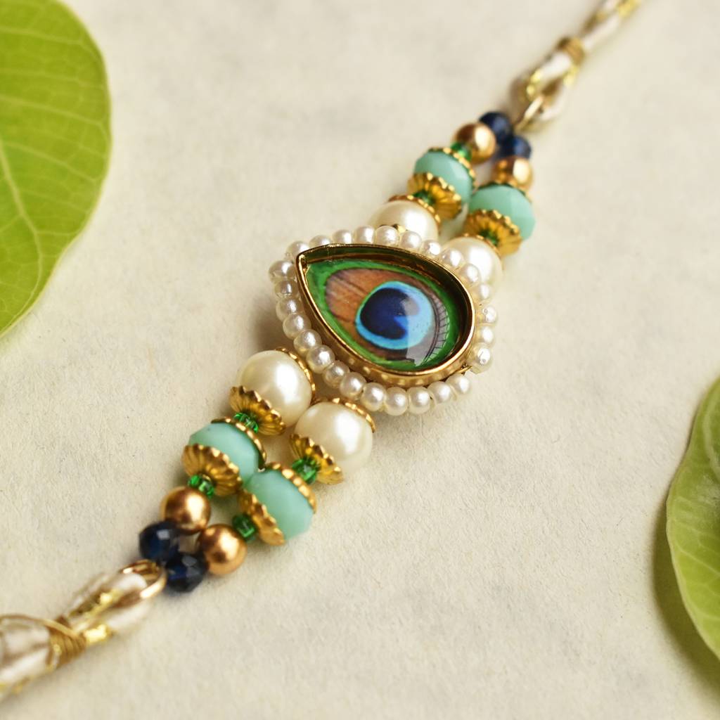 Mor Pankh Beaded Rakhi With Roli Chawal Capsules : ACJR091
