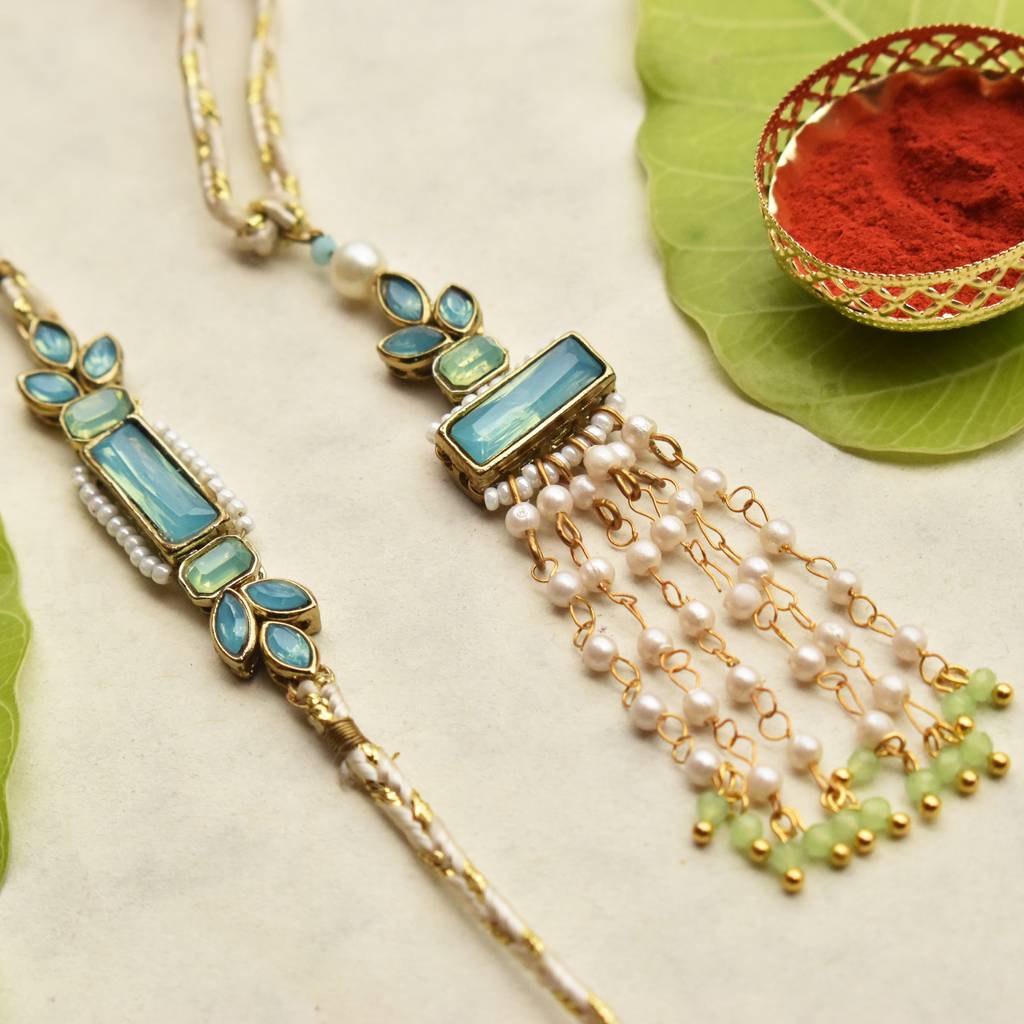 Ocean Bloom & Aqua Blossom Rakhi-Lumba Set With Roli Chawal Capsules : ACRL078ACJR094