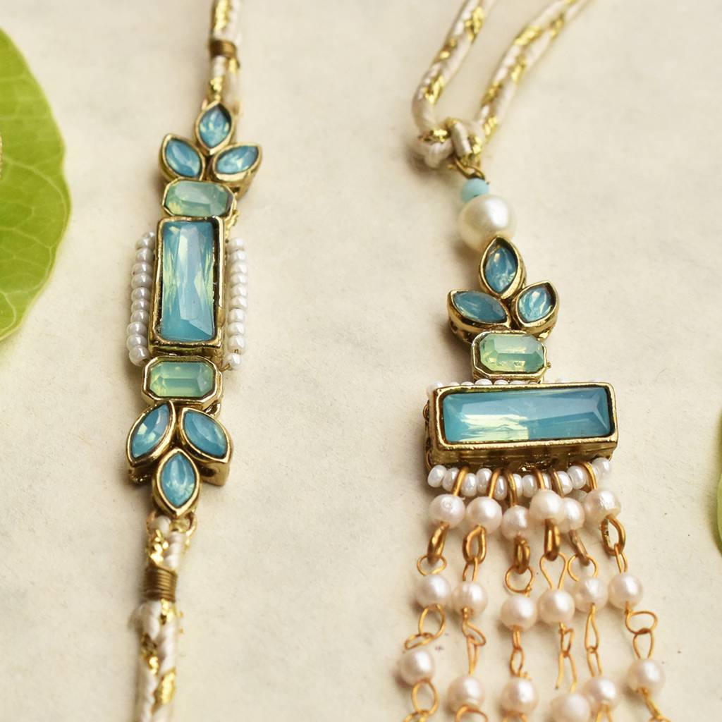 Ocean Bloom & Aqua Blossom Rakhi-Lumba Set With Roli Chawal Capsules : ACRL078ACJR094