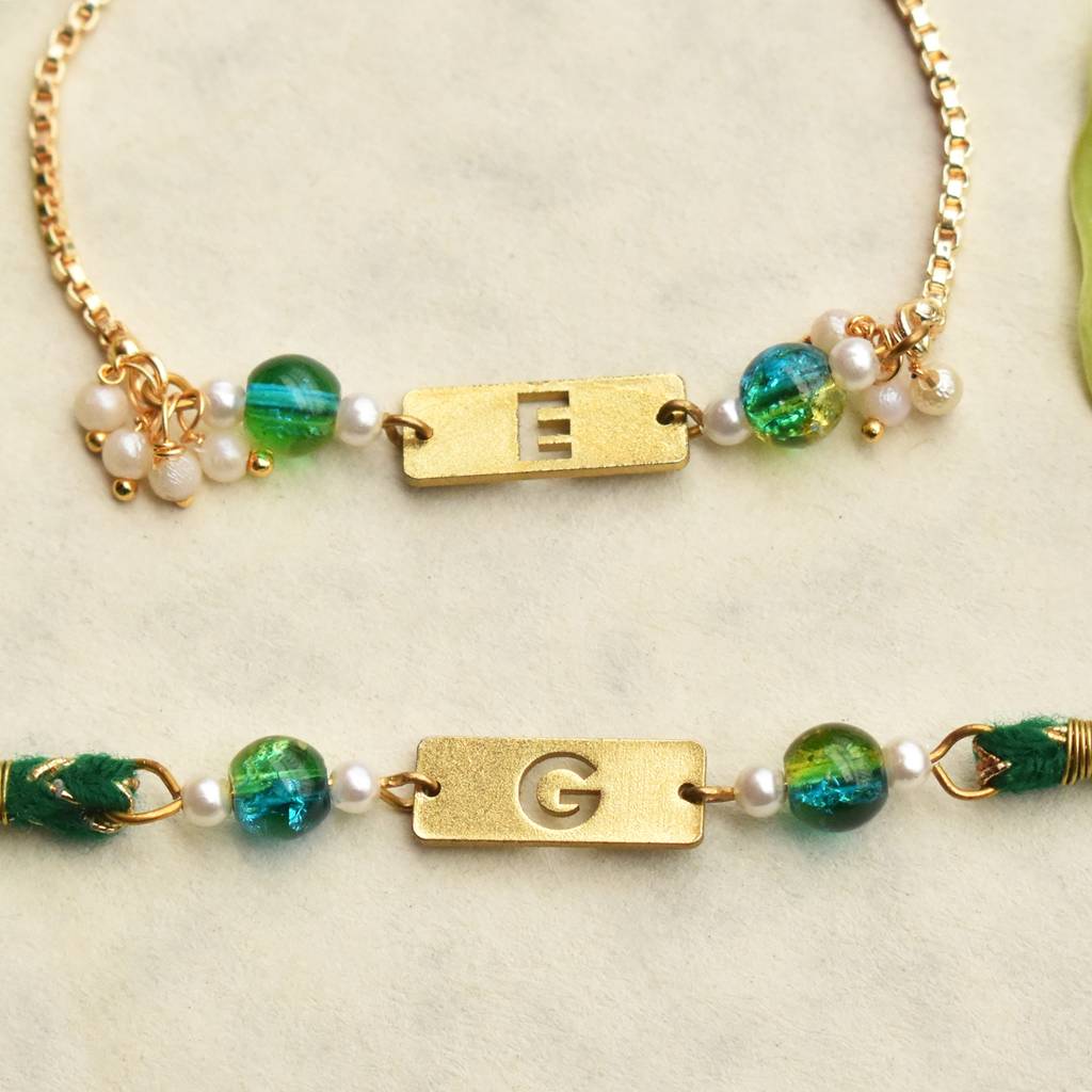 Green Grace & Pearl Charm Personalised Rakhi-Lumba Set With Roli Chawal Capsules : ACRL076ACJR093