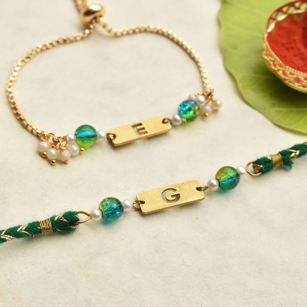Green Grace & Pearl Charm Personalised Rakhi-Lumba Set With Roli Chawal Capsules : ACRL076ACJR093