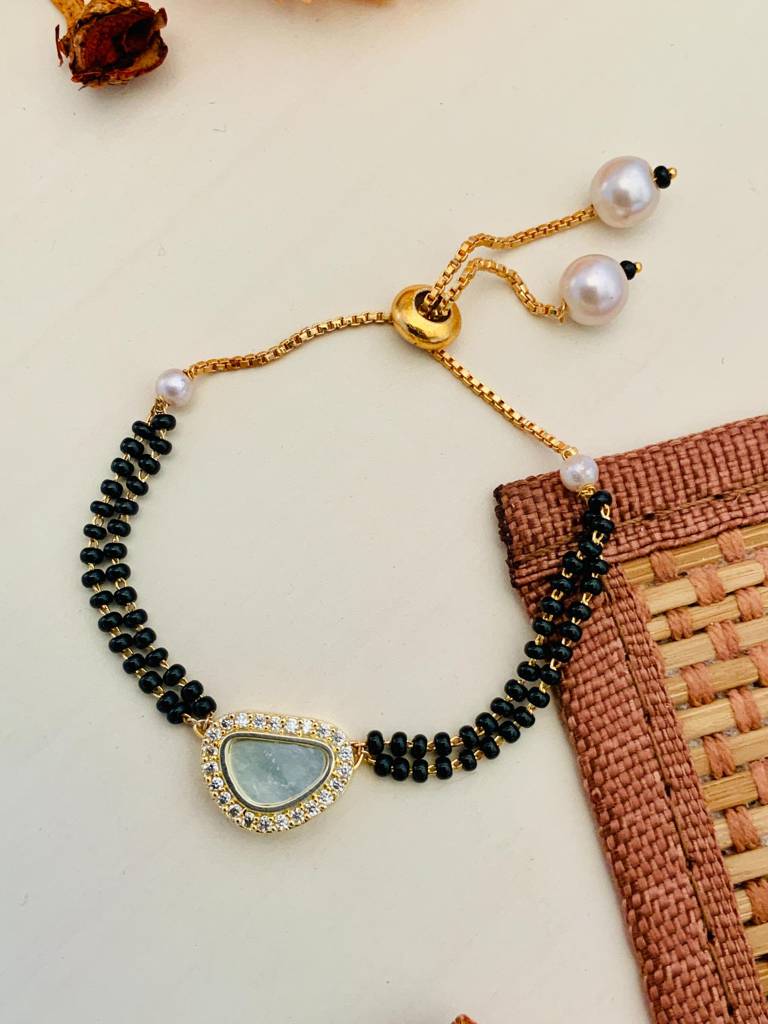 Pleasing Mother Pearl Gold Plated Hand Mangalsutra : GPHMMPBeanWhite