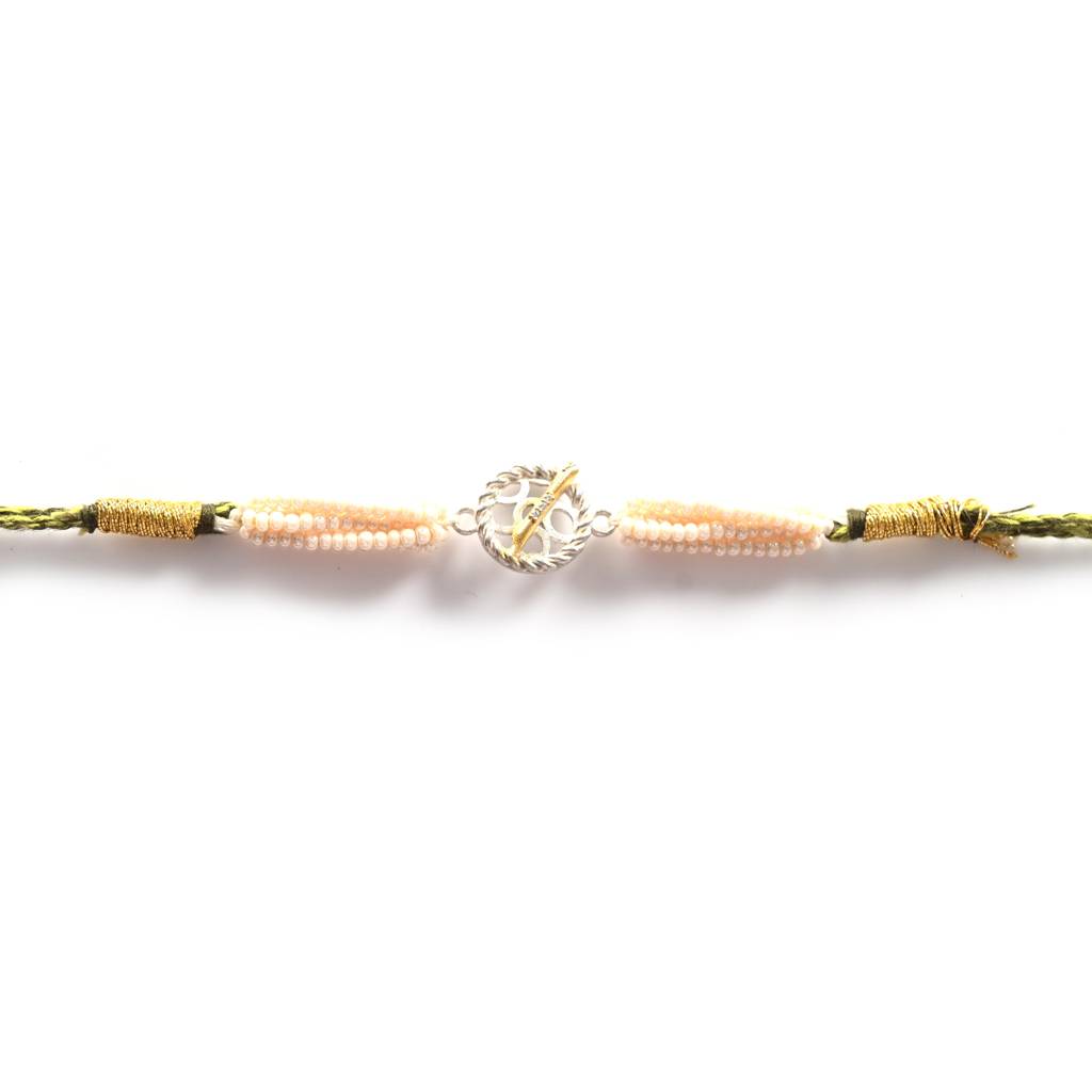 Handcrafted Flute Rakhi In 925 Silver : HFRA026