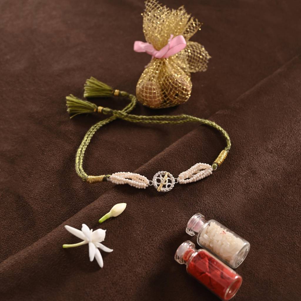Handcrafted Flute Rakhi In 925 Silver : HFRA026