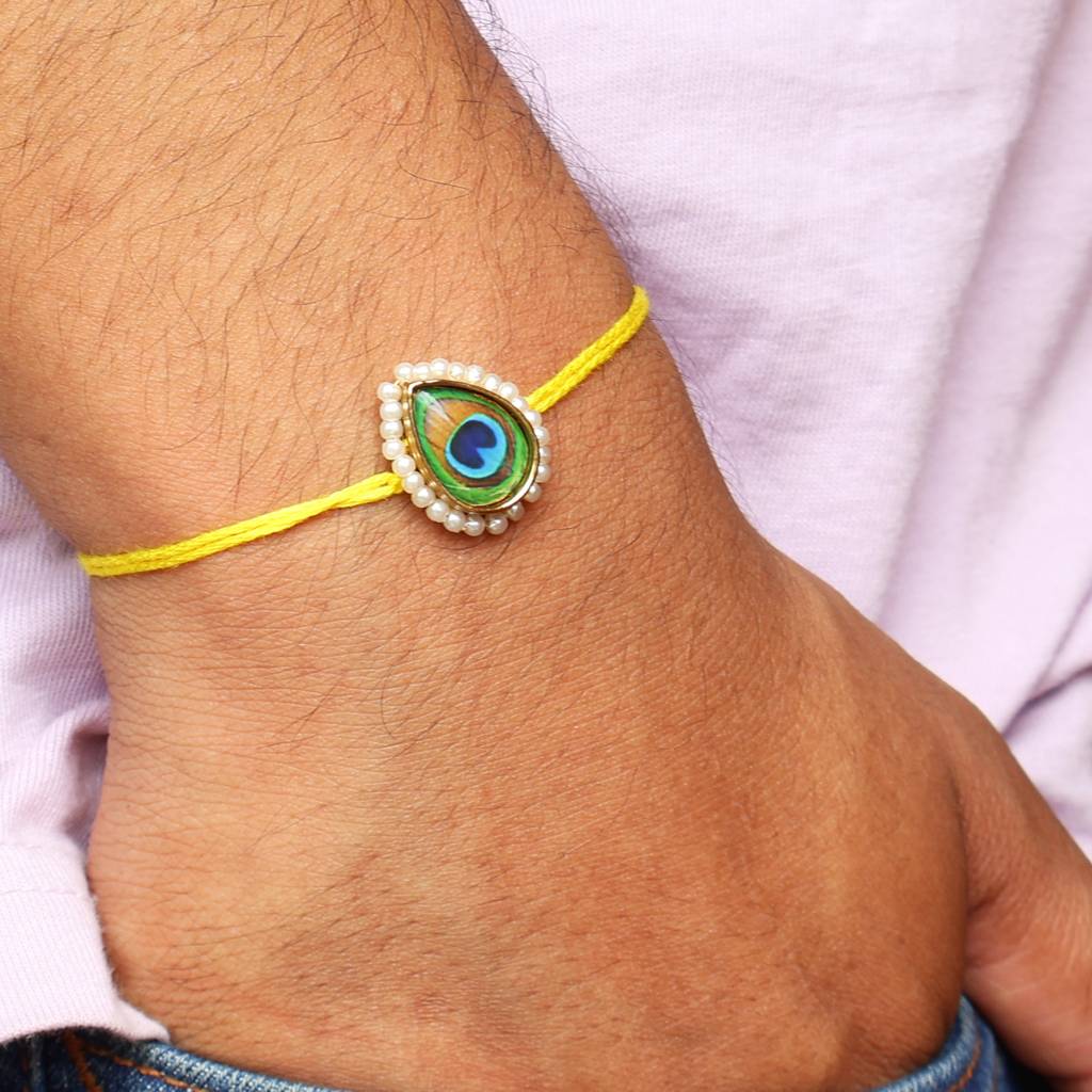 Mor Pankh Rakhi With Roli Chawal Capsules : ACJR095