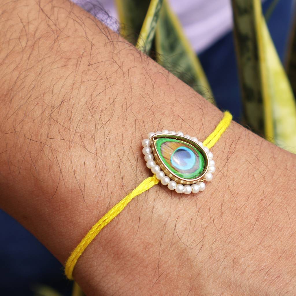Mor Pankh Rakhi With Roli Chawal Capsules : ACJR095