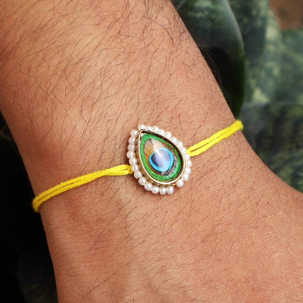 Mor Pankh Rakhi With Roli Chawal Capsules : ACJR095