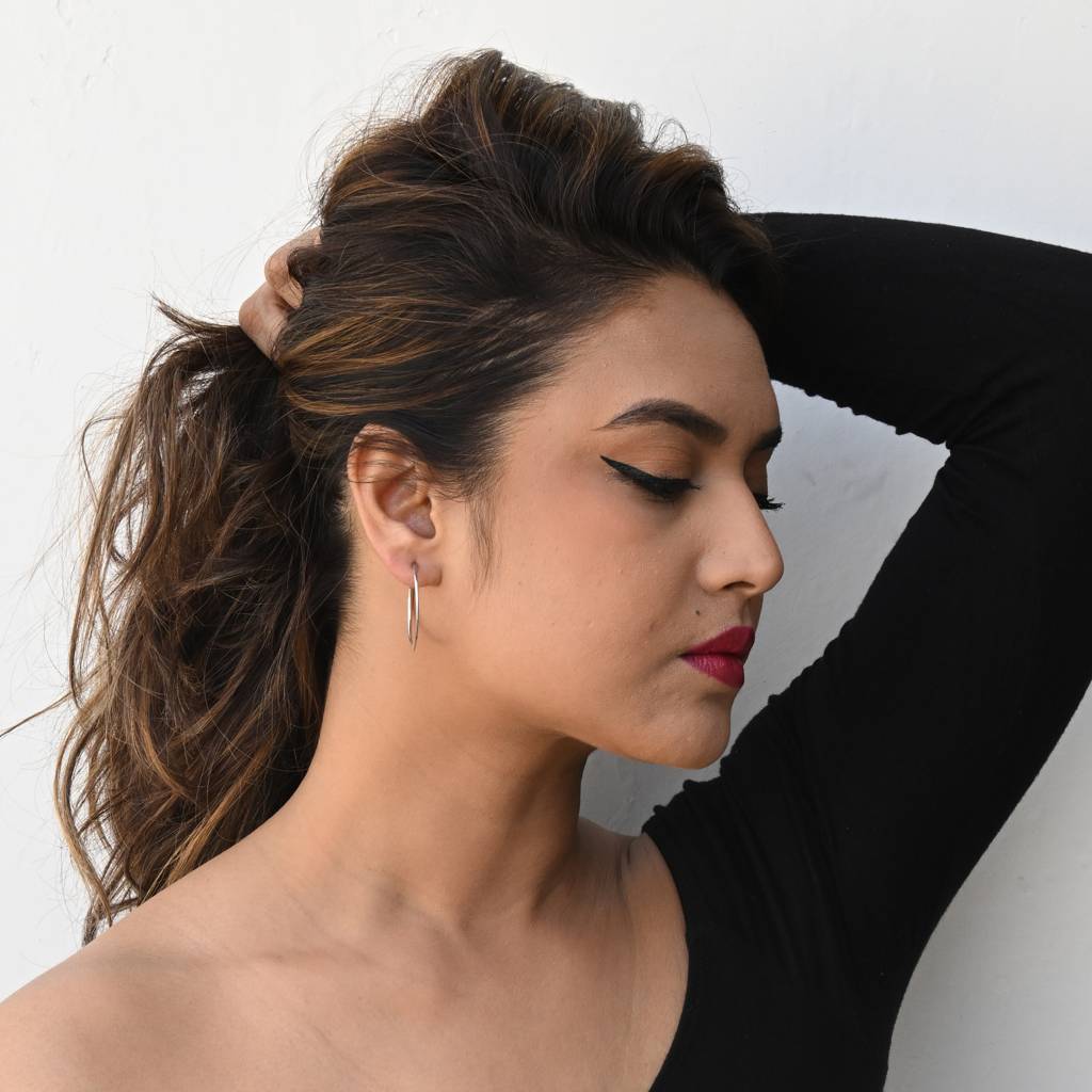 Lustrous Sterling Silver Hoop Earrings Designed To Add Grace And Glamour To Any Outfit : TWP1260