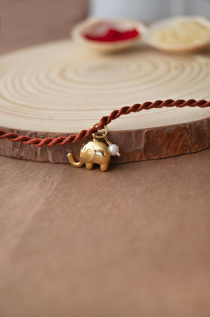 Mannash Cute Elephant With Pearl Gold Plated Sterling Silver Charm Rakhi : MCYCR673D1620