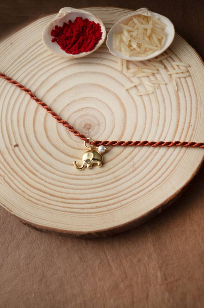 Mannash Cute Elephant With Pearl Gold Plated Sterling Silver Charm Rakhi : MCYCR673D1620