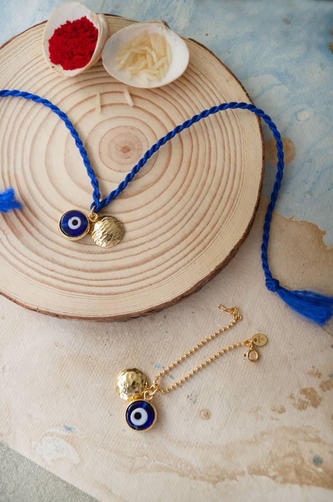 Mannash Evil Eye Gold Plated Sterling Silver Bhaia Bhabhi Rakhi Combo : MCYCWR667D1648