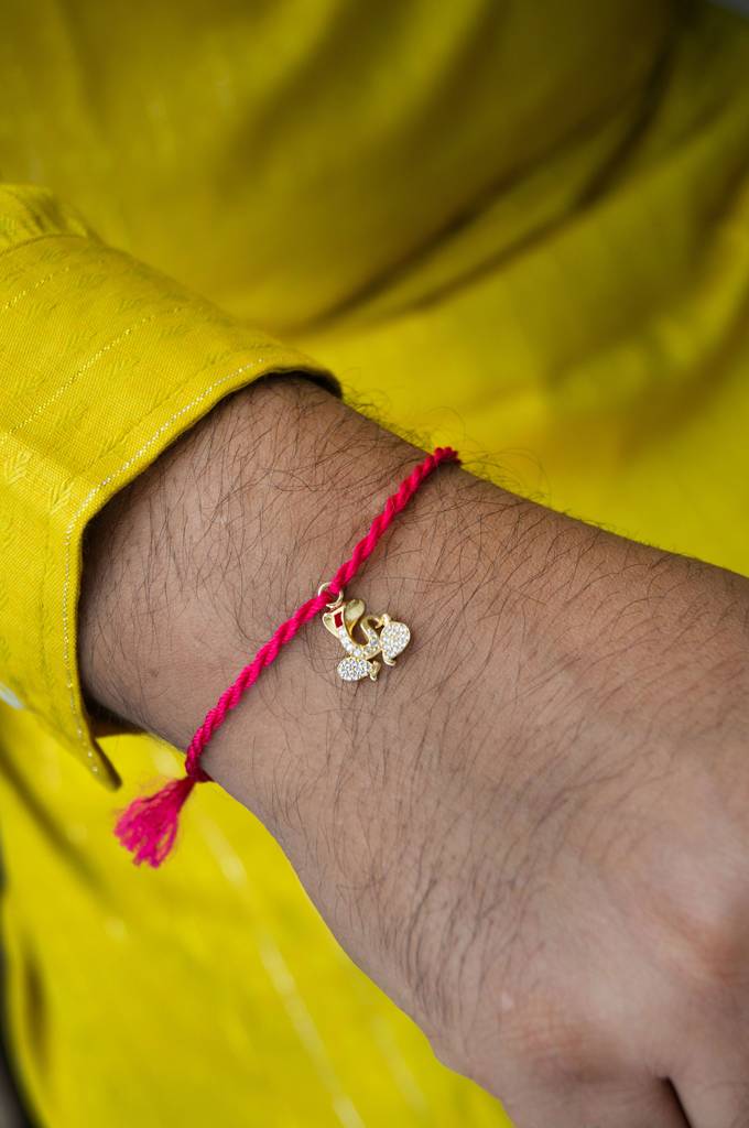 Mannash Divine Ganesha Gold Plated Sterling Silver Charm Rakhi : MZYCR672D1616