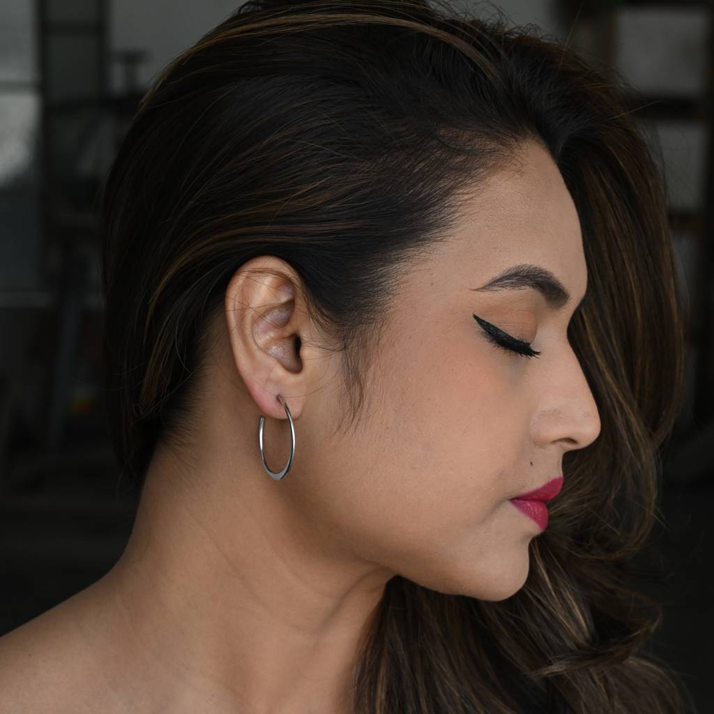 Lustrous Sterling Silver Hoop Earrings Designed To Add Grace And Glamour To Any Outfit : TWP1260