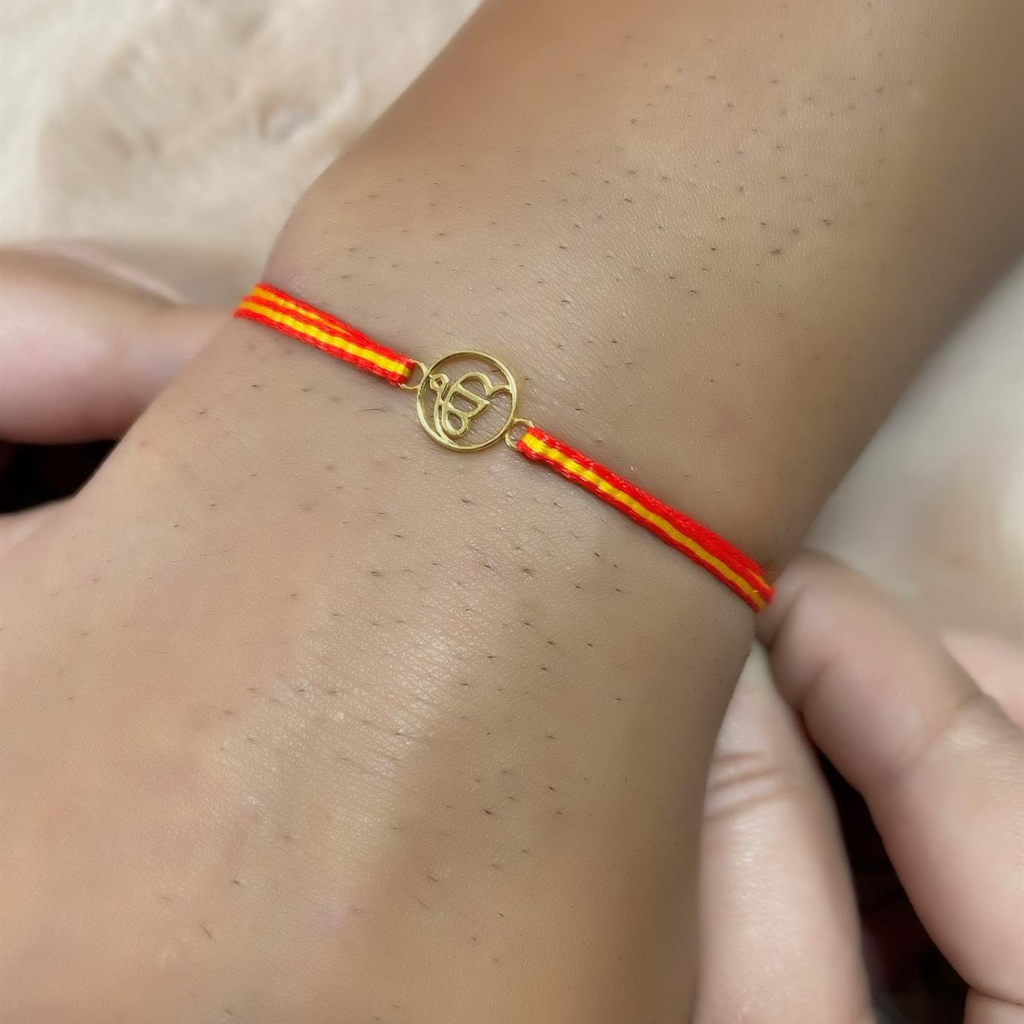 Kuberbox Yellow Gold Ik Onkar Rakhi : RA2062
