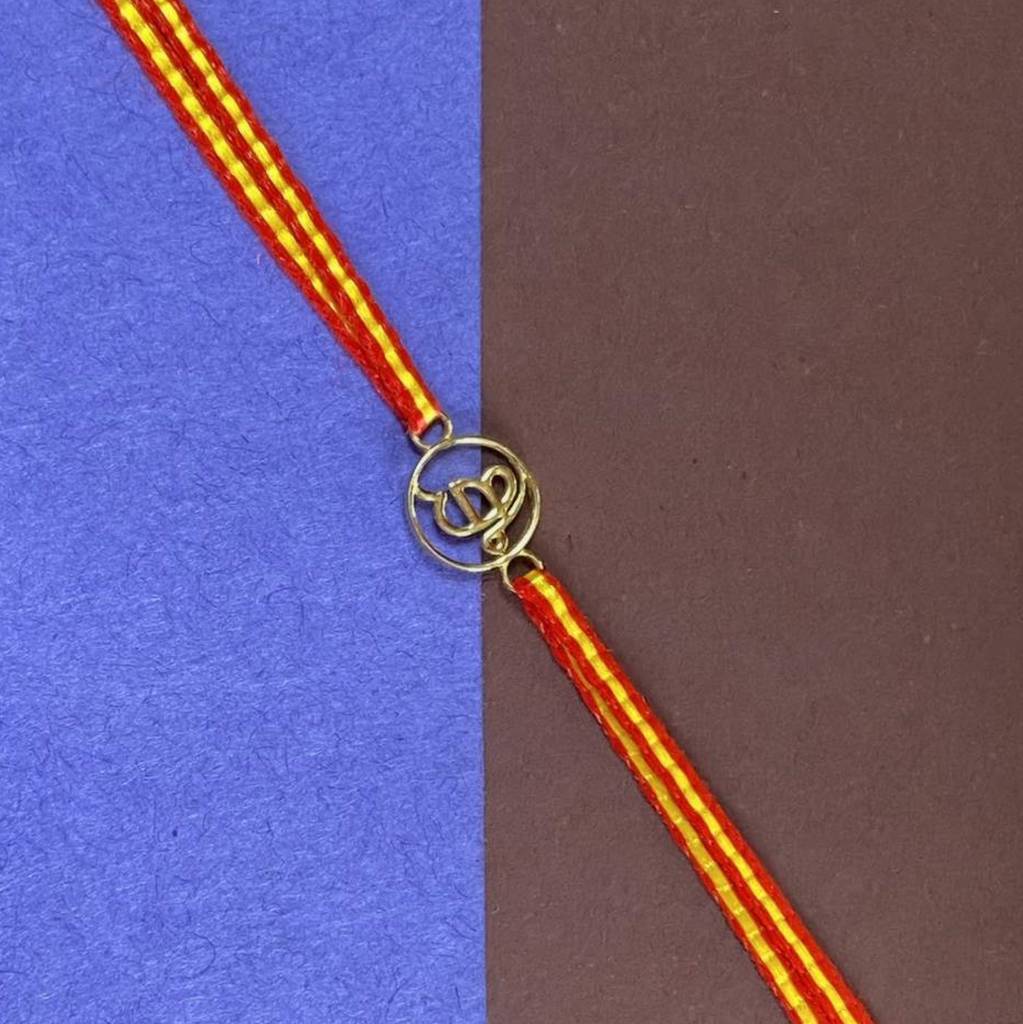 Kuberbox Yellow Gold Ik Onkar Rakhi : RA2062