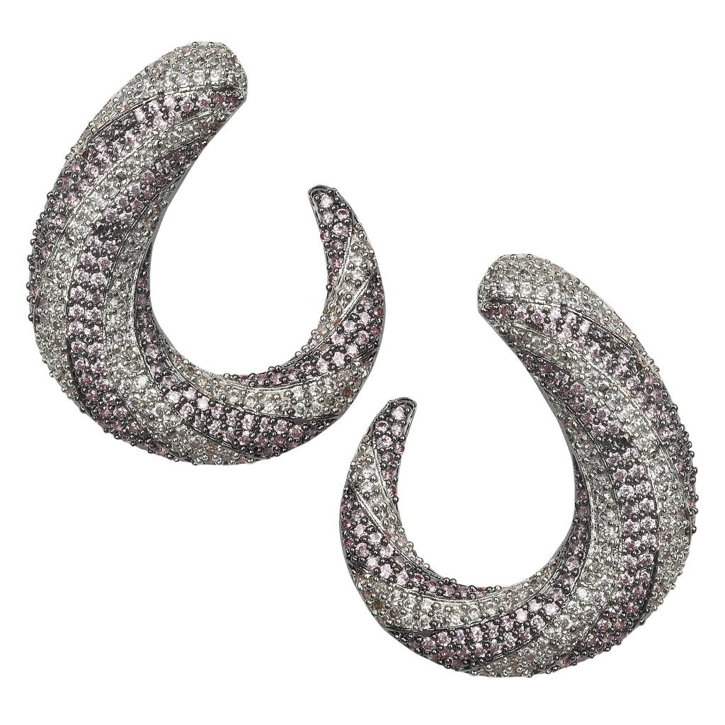 Closed Setting Lilac And Clear Cubic Zirconia Studs In An Interesting Swirl Design : RK-ER-ENN-530-PURPLE